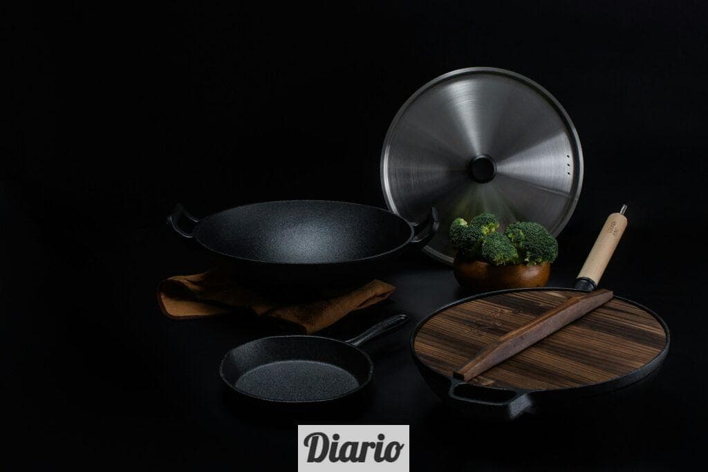 brown wooden handled stainless steel cooking pan